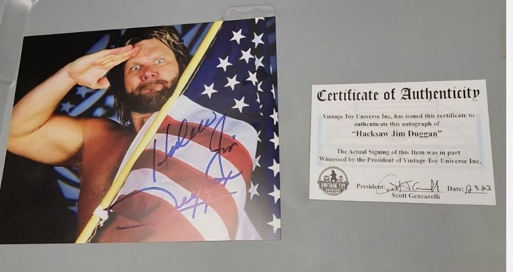 Hacksaw Jim Duggan Autographed American Flag Photo with COA